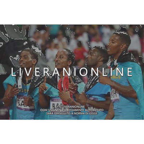 (120810) -- LONDON, Aug. 10, 2012 () -- Runners of Bahamas celebrate after men\'s 4x400m relay final at London 2012 Olympic Games, London, Britain, Aug. 10, 2012. The Bahamian team won gold medal with 2:56.72. (/Liao Yujie)(zgp) AG ALDO LIVERANI S A S ONLY ITALY