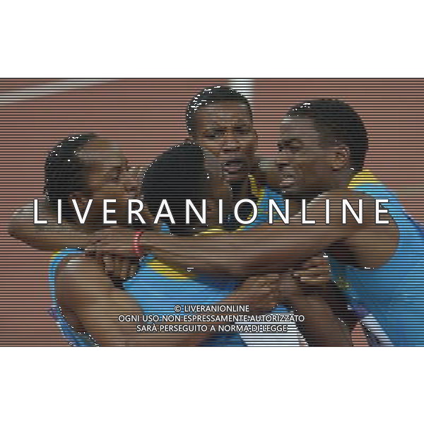 (120810) -- LONDON, Aug. 10, 2012 () -- Runners of Bahamas celebrate after men\'s 4x400m relay final at London 2012 Olympic Games, London, Britain, Aug. 10, 2012. The Bahamian team won gold medal with 2:56.72. (/Gong Lei)(zgp) AG ALDO LIVERANI S A S ONLY ITALY