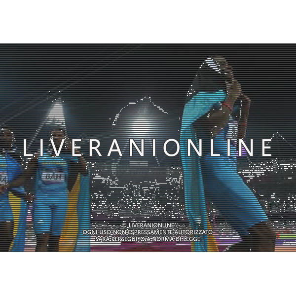 (120810) -- LONDON, Aug. 10, 2012 () -- Runners of Bahamas celebrate after men\'s 4x400m relay final at London 2012 Olympic Games, London, Britain, Aug. 10, 2012. The Bahamian team won gold medal with 2:56.72. (/Yin Gang)(zgp) AG ALDO LIVERANI S A S ONLY ITALY