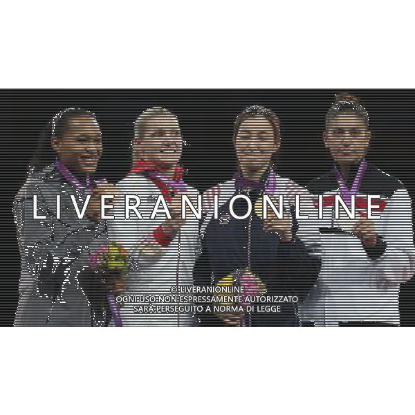 (120810) -- LONDON, Aug. 10, 2012 () -- Gold medalist Hwang Kyung Seon of South Korea (2nd R), silver medalist Nur Tatar of Turkey (1st R), bronze medalists Paige McPherson of the Unied States (1st L) and Helena Fromm of Germany pose at the awarding ceremony of women\'s Taekwondo -67kg event at London 2012 Olympic Games in London, Britain, on August 10, 2012. (/Wang Lili) AG ALDO LIVERANI S A S ONLY ITALY