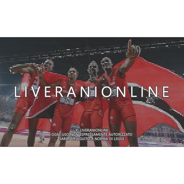 (120810) -- LONDON, Aug. 10, 2012 () -- Runners of Trinidad And Tobago celebrate after men\'s 4x400m relay final at London 2012 Olympic Games, London, Britain, Aug. 10, 2012. The team of Trinidad And Tobago won bronze medal with 2:59.40. (/Yin Gang)(zgp) AG ALDO LIVERANI S A S ONLY ITALY