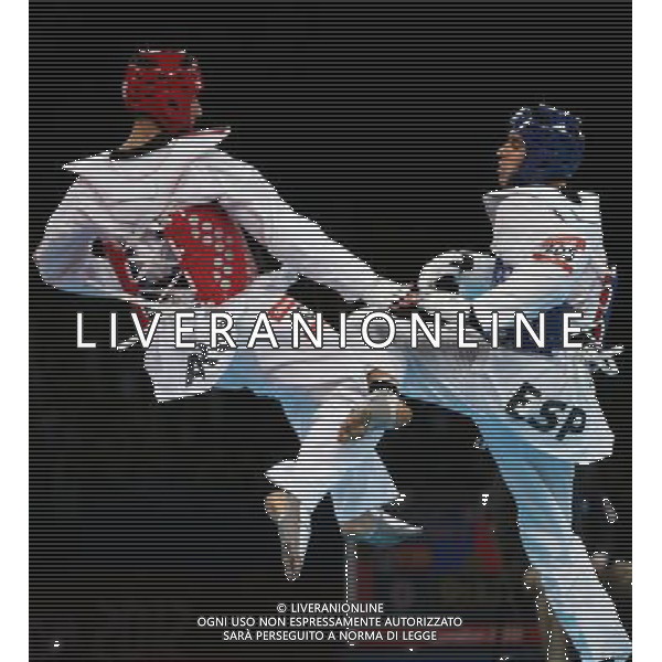 (120810) -- LONDON, Aug. 10, 2012 () -- Sebastian Eduardo Crismanich of Argentina (red) competes with Nicolas Garcia Hemme of Spain during the gold medal match of men\'s Taekwondo -80kg event at London 2012 Olympic Games in London, Britain, on August 10, 2012. Sebastian Eduardo Crismanich of Argentina won the match and claimed the gold medal of the event. (/Wang Lili) AG ALDO LIVERANI S A S ONLY ITALY
