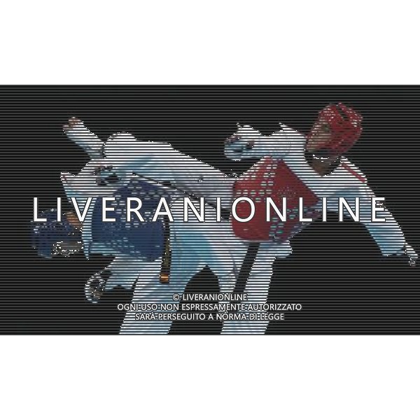 (120810) -- LONDON, Aug. 10, 2012 () -- Sebastian Eduardo Crismanich of Argentina (red) competes with Nicolas Garcia Hemme of Spain during the gold medal match of men\'s Taekwondo -80kg event at London 2012 Olympic Games in London, Britain, on August 10, 2012. Sebastian Eduardo Crismanich of Argentina won the match and claimed the gold medal of the event. (/Wang Lili) AG ALDO LIVERANI S A S ONLY ITALY