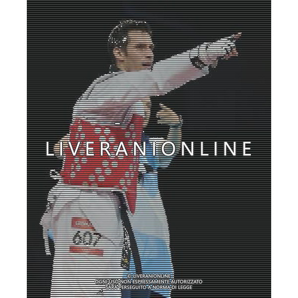 (120810) -- LONDON, Aug. 10, 2012 () -- Sebastian Eduardo Crismanich of Argentina (red) celebrates after winning over Nicolas Garcia Hemme of Spain during the gold medal match of men\'s Taekwondo -80kg event at London 2012 Olympic Games in London, Britain, on August 10, 2012. Sebastian Eduardo Crismanich of Argentina won the match and claimed the gold medal of the event. (/Wang Lili) AG ALDO LIVERANI S A S ONLY ITALY