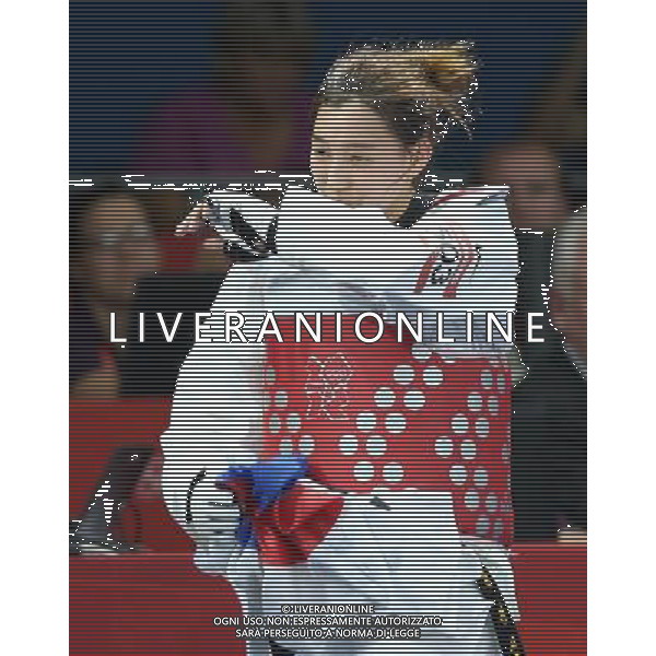 (120810) -- LONDON, Aug. 10, 2012 () -- Hwang Kyung Seon of South Korea celebrates after winning over Nur Tatar of Turkey during the gold medal match of women\'s Taekwondo -67kg event at London 2012 Olympic Games in London, Britain, on August 10, 2012. Hwang Kyung Seon of South Korea won the match and claimed the gold medal of the event. (/Wang Lili) AG ALDO LIVERANI S A S ONLY ITALY