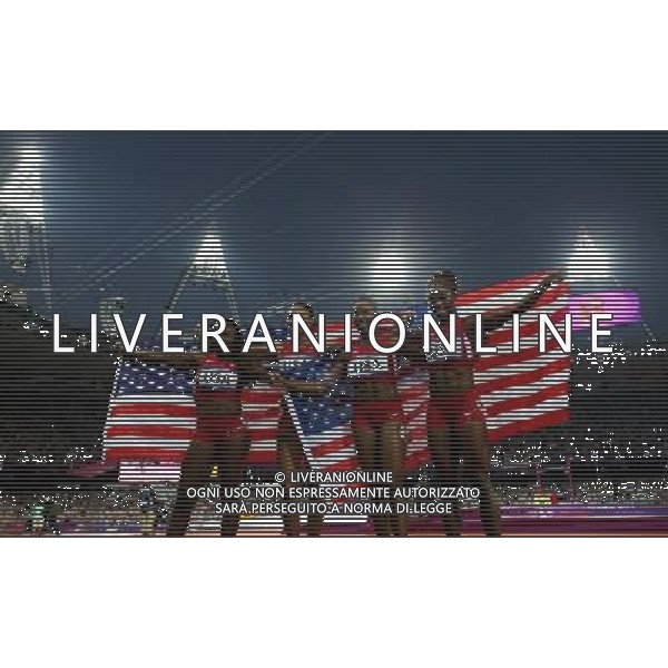 (120810) -- LONDON, Aug. 10, 2012 () -- Runners of U.S. celebrate after women\'s 4x100m relay final at London 2012 Olympic Games, London, Britain, Aug. 10, 2012. The U.S. team won gold medal in this event with a new world record of 40.82. (/Yin Gang)(zgp) AG ALDO LIVERANI S A S ONLY ITALY
