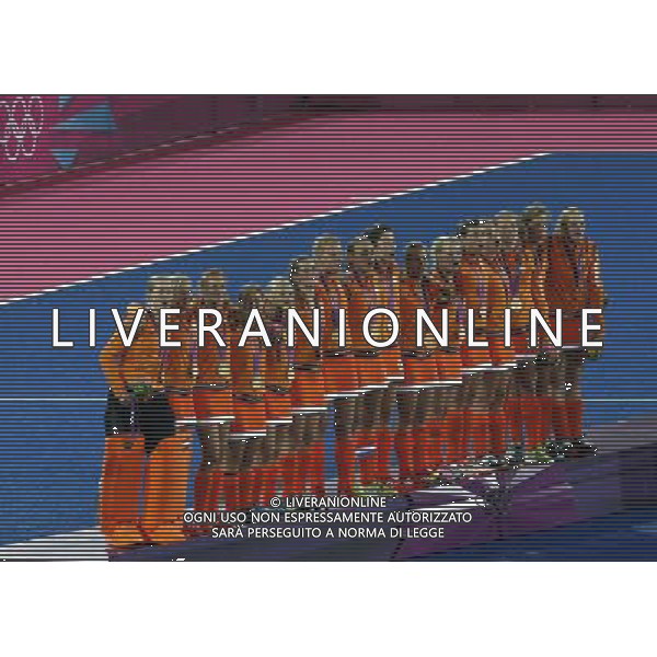 (120810) -- LONDON, Aug. 10, 2012 () -- Gold medalists players of the Netherlands sing the national anthem at the awarding ceremony of women\'s hockey event at London 2012 Olympic Games, London, Britain, Aug. 10, 2012. (/Shen Bohan) AG ALDO LIVERANI S A S ONLY ITALY