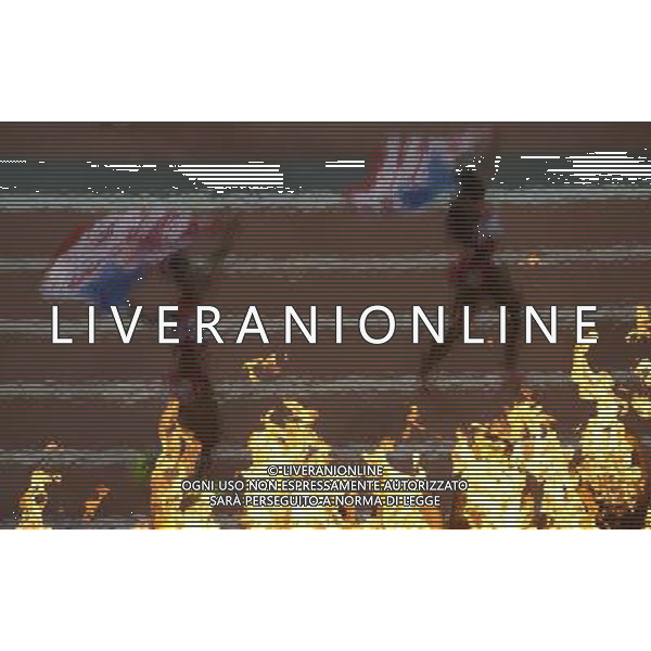 (120810) -- LONDON, Aug. 10, 2012 () -- Runners of U.S. celebrate after women\'s 4x100m relay final at London 2012 Olympic Games, London, Britain, Aug. 10, 2012. The U.S. team won gold medal in this event with a new world record of 40.82. (/Qi Heng)(zgp) AG ALDO LIVERANI S A S ONLY ITALY