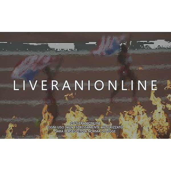 (120810) -- LONDON, Aug. 10, 2012 () -- Runners of U.S. celebrate after women\'s 4x100m relay final at London 2012 Olympic Games, London, Britain, Aug. 10, 2012. The U.S. team won gold medal in this event with a new world record of 40.82. (/Qi Heng)(zgp) AG ALDO LIVERANI S A S ONLY ITALY