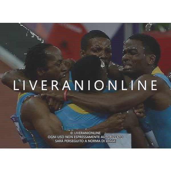 (120810) -- LONDON, Aug. 10, 2012 () -- Runners of Bahamas celebrate after men\'s 4x400m relay final at London 2012 Olympic Games, London, Britain, Aug. 10, 2012. The Bahamian team won gold medal with 2:56.72. (/Wang Jianhua)(zgp) AG ALDO LIVERANI S A S ONLY ITALY