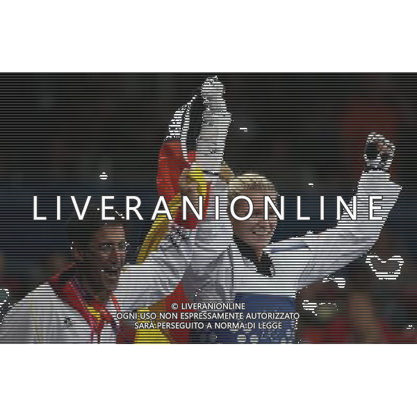 (120810) -- LONDON, Aug. 10, 2012 () -- Helena Fromm of Germany (blue) celebrates after winning over Carmen Marton of Australia during the bronze medal match of women\'s Taekwondo -67kg event at London 2012 Olympic Games in London, Britain, on August 10, 2012. Helena Fromm of Germany won the match and claimed the bronze medal of the event. (/Wang Lili) AG ALDO LIVERANI S A S ONLY ITALY