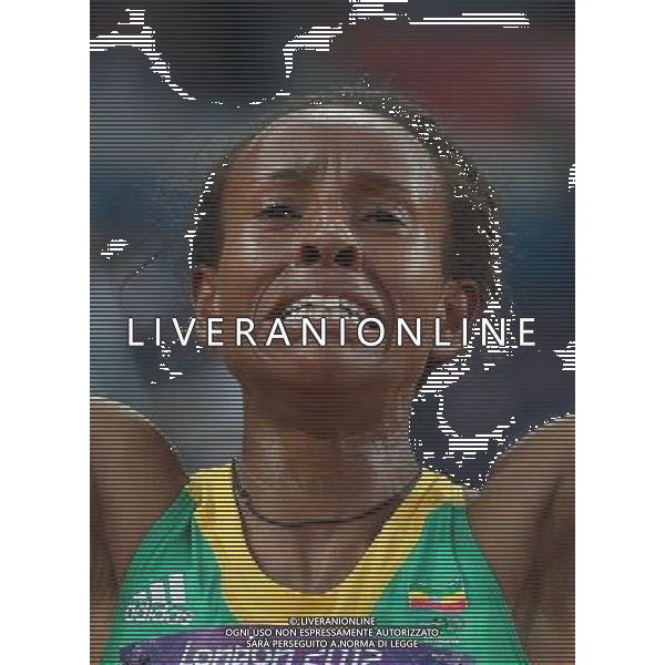 (120810) -- LONDON, Aug. 10, 2012 () -- Meseret Defar of Ethiopia celebrates after women\'s 5000m final at London 2012 Olympic Games, London, Britain, Aug. 10, 2012. Meseret Defar won gold medal with 15:04.25. (/Liao Yujie)(zgp) AG ALDO LIVERANI S A S ONLY ITALY