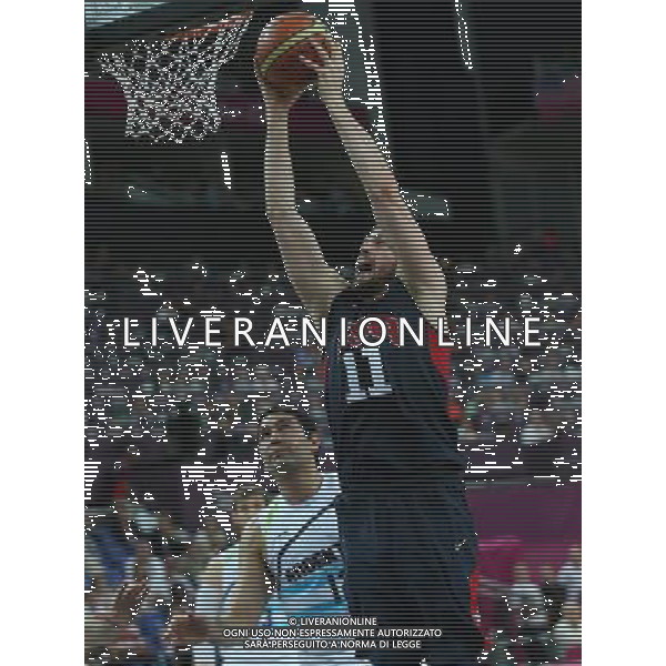 (120810) -- LONDON, Aug. 10, 2012 () -- Kevin Love of the United States goes up for the basket during the men\'s basketball semifinal match between the United States and Argentina at London 2012 Olympic Games, London, Britain, Aug. 10, 2012. (/Meng Yongmin) AG ALDO LIVERANI S A S ONLY ITALY