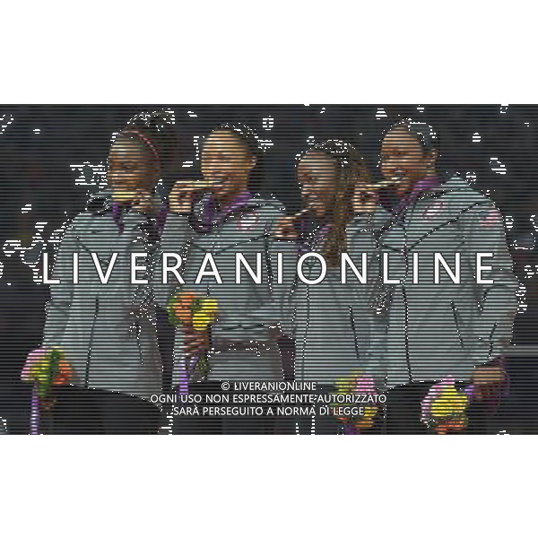 (120810) -- LONDON, Aug. 10, 2012 () -- Tianna Madison, Allyson Felix, Bianca Knight and Carmelita Jeter (from L to R) of U.S. pose at awarding ceremony of women\'s 4x100m relay at London 2012 Olympic Games, London, Britain, Aug. 10, 2012. The U.S. team won gold medal in this event with a new world record of 40.82. (/Gesang Dawa)(zgp) AG ALDO LIVERANI S A S ONLY ITALY