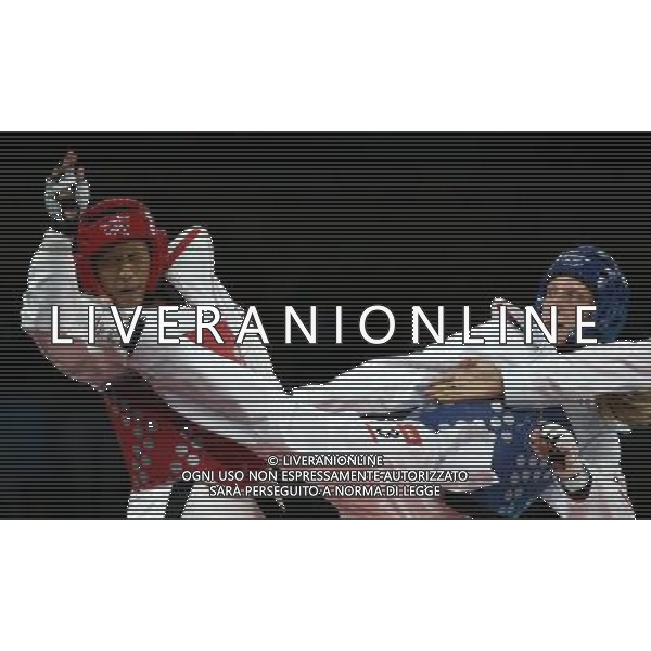 (120810) -- LONDON, Aug. 10, 2012 () -- Franka Anic of Slovenia (blue) competes with Paige McPherson of the United States during the bronze medal match of women\'s Taekwondo -67kg event at London 2012 Olympic Games in London, Britain, on August 10, 2012. Paige McPherson of the United States won the match and claimed the bronze medal of the event. (/Wang Lili) AG ALDO LIVERANI S A S ONLY ITALY