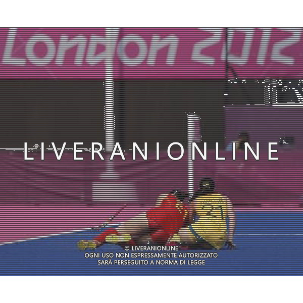 (120810) -- LONDON, Aug. 10, 2012 () -- Jayde Taylor (R) of Australia falls with Zhao Yudiao of China during women\'s hockey classification 5th-6th match between China and Australia, at London 2012 Olympic Games in London, Britain, on August 10, 2012. Australia won 2-0. (/Shen Bohan) (nxl) ©photoshot/Agenzia Aldo Liverani Sas - ITALY ONLY - GIOCHI OLIMPICI, OLIMPIADI LONDRA 2012