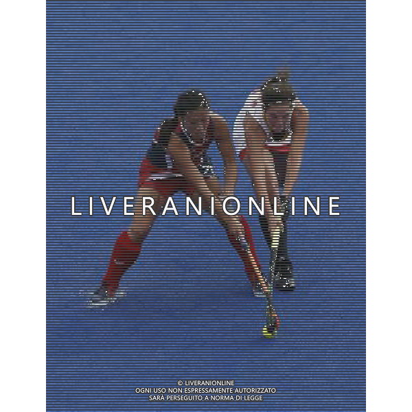 (120810) -- LONDON, Aug. 10, 2012 () -- Kayla Bashore-Smedley of USA (L) competes with Anouk Raes of Belgium during women\'s hockey classification 11th-12th match between Belgium and USA, at London 2012 Olympic Games in London, Britain, on August 10, 2012. Belgium won 2-1. (/Shen Bohan) (nxl) ©photoshot/Agenzia Aldo Liverani Sas - ITALY ONLY - GIOCHI OLIMPICI, OLIMPIADI LONDRA 2012