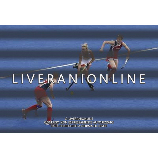 (120810) -- LONDON, Aug. 10, 2012 () -- Charlotte de Vos of Belgium (C) controls the ball during women\'s hockey classification 11th-12th match between Belgium and USA, at London 2012 Olympic Games in London, Britain, on August 10, 2012. Belgium won 2-1. (/Shen Bohan) (nxl) ©photoshot/Agenzia Aldo Liverani Sas - ITALY ONLY - GIOCHI OLIMPICI, OLIMPIADI LONDRA 2012