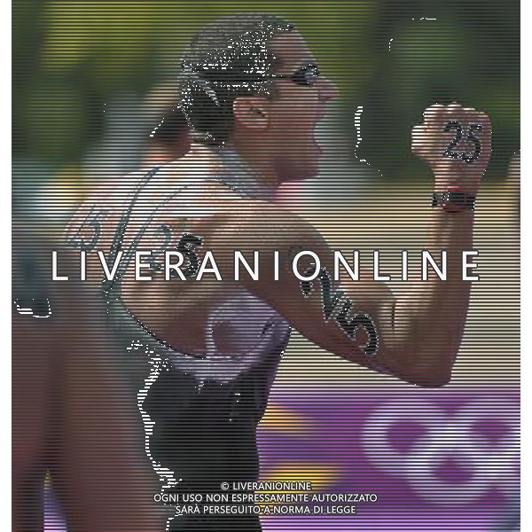 (120810) -- LONDON, Aug. 10, 2012 () -- Oussama Mellouli of Tunisia celebrates after winning in men\'s swimming 10km marathon, at London 2012 Olympic Games in London, Britain, on August 10, 2012. (/Chen Xiaowei) (nxl) ©photoshot/Agenzia Aldo Liverani Sas - ITALY ONLY - GIOCHI OLIMPICI, OLIMPIADI LONDRA 2012