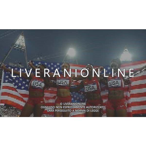 (120810) -- LONDON, Aug. 10, 2012 () -- The U.S. runners celebrate after women\'s 4x100m relay final at London 2012 Olympic Games, London, Britain, Aug. 10, 2012. The U.S. team won gold medal in this event with a new world record of 40.82. (/Gesang Dawa)(zgp) ©photoshot/Agenzia Aldo Liverani Sas - ITALY ONLY - GIOCHI OLIMPICI, OLIMPIADI LONDRA 2012