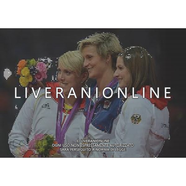 (120809) -- LONDON, Aug. 9, 2012 () -- Gold medalist Barbora Spotakova (C) of Czech Republic, silver medalist Christina Obergfoll (L) of Germany, and bronze medalist Linda Stahl of Germany pose at awarding ceremony of women\'s javelin throw event, at London 2012 Olympic Games, London, Britain, Aug. 9, 2012. (/Gesang Dawa)(zgp) ©photoshot/Agenzia Aldo Liverani Sas - ITALY ONLY - GIOCHI OLIMPICI, OLIMPIADI LONDRA 2012
