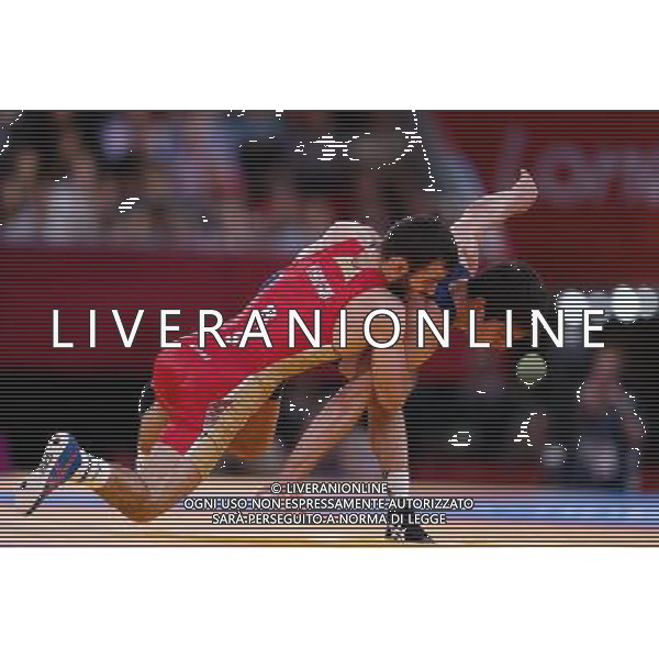 (120810) -- LONDON, Aug. 10, 2012 () -- Dzhamal Otarsultanov of Russia (red) competes with Vladimer Khinchegashvili of Georgia during the gold medal match of men\'s freestyle 55kg of Wrestling event at London 2012 Olympic Games in London, Britain, on August 10, 2012. Dzhamal Otarsultanov of Russia won the match and claimed the gold medal of the event. (/Jin Liwang) (nxl) ©photoshot/Agenzia Aldo Liverani Sas - ITALY ONLY - GIOCHI OLIMPICI, OLIMPIADI LONDRA 2012