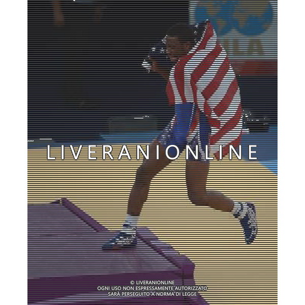(120810) -- LONDON, Aug. 10, 2012 () -- Jordan Ernest Burroughs of USA (in blue) celebrates after defeating Sadegh Saeed Goudarzi of Iran in men\'s wrestling freestyle 74kg gold medal contest, at London 2012 Olympic Games in London, Britain, on August 10, 2012. Jordan Ernest Burroughs of USA won gold medal. (/Guo Yong) (nxl) ©photoshot/Agenzia Aldo Liverani Sas - ITALY ONLY - GIOCHI OLIMPICI, OLIMPIADI LONDRA 2012