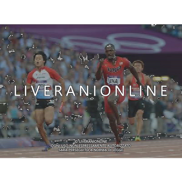 (120810) -- LONDON, Aug. 10, 2012 () -- Justin Gatlin (front) of USA competes during men\'s 4x100m relay heat at London 2012 Olympic Games, London, Britain, Aug. 10, 2012. The USA team advanced to final. (/Li Gang)(zgp) ©photoshot/Agenzia Aldo Liverani Sas - ITALY ONLY - GIOCHI OLIMPICI, OLIMPIADI LONDRA 2012