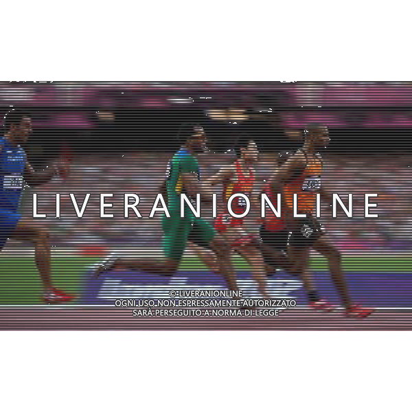 (120810) -- LONDON, Aug. 10, 2012 () -- China\'s runner (3rd R) competes during men\'s 4x100m relay heat at London 2012 Olympic Games, London, Britain, Aug. 10, 2012. The Chinese team was disqualified for final with 38.38. (/Yin Gang)(zgp) ©photoshot/Agenzia Aldo Liverani Sas - ITALY ONLY - GIOCHI OLIMPICI, OLIMPIADI LONDRA 2012