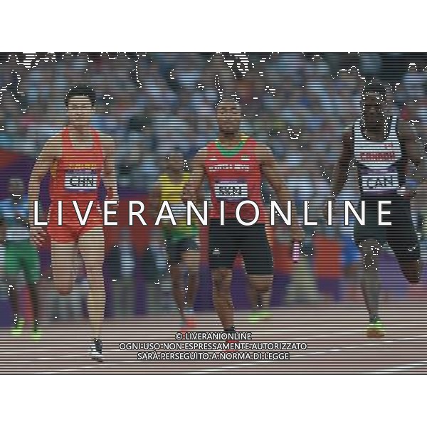 (120810) -- LONDON, Aug. 10, 2012 () -- China\'s Zhang Peimeng (L) sprints during men\'s 4x100m relay heat at London 2012 Olympic Games, London, Britain, Aug. 10, 2012. The Chinese team was disqualified for final with 38.38. (/Li Gang)(zgp) ©photoshot/Agenzia Aldo Liverani Sas - ITALY ONLY - GIOCHI OLIMPICI, OLIMPIADI LONDRA 2012