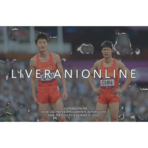 (120810) -- LONDON, Aug. 10, 2012 () -- China\'s Su Bingtian (R) and Zhang Beimeng react after men\'s 4x100m relay heat at London 2012 Olympic Games, London, Britain, Aug. 10, 2012. The Chinese team was disqualified for final with 38.38. (/Li Gang)(zgp) ©photoshot/Agenzia Aldo Liverani Sas - ITALY ONLY - GIOCHI OLIMPICI, OLIMPIADI LONDRA 2012