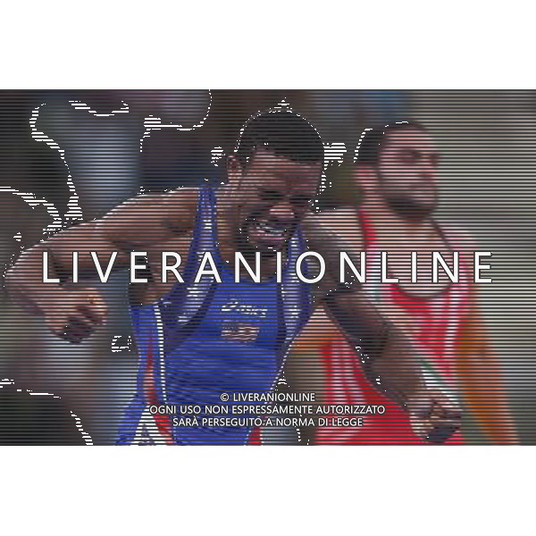 (120810) -- LONDON, Aug. 10, 2012 () -- Jordan Ernest Burroughs of USA (in blue) celebrates after defeating Sadegh Saeed Goudarzi of Iran in men\'s wrestling freestyle 74kg gold medal contest, at London 2012 Olympic Games in London, Britain, on August 10, 2012. Jordan Ernest Burroughs of USA won gold medal. (/Jin Liwang) (nxl) ©photoshot/Agenzia Aldo Liverani Sas - ITALY ONLY - GIOCHI OLIMPICI, OLIMPIADI LONDRA 2012