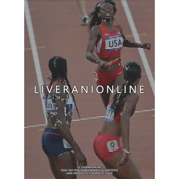 (120810) -- LONDON, Aug. 10, 2012 () -- Runners of USA relay during women\'s 4x400m relay heat at London 2012 Olympic Games, London, Britain, Aug. 10, 2012. The USA team advanced to final. (/Gong Lei)(zgp) ©photoshot/Agenzia Aldo Liverani Sas - ITALY ONLY - GIOCHI OLIMPICI, OLIMPIADI LONDRA 2012