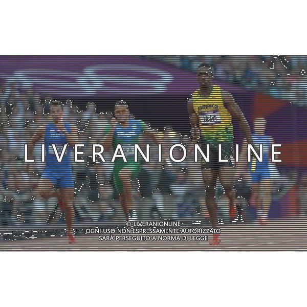 (120810) -- LONDON, Aug. 10, 2012 () -- Kemar Bailey-Cole (R) of Jamaica competes during men\'s 4x100m relay heat at London 2012 Olympic Games, London, Britain, Aug. 10, 2012. The Jamaican team advanced to final. (/Li Gang)(zgp) ©photoshot/Agenzia Aldo Liverani Sas - ITALY ONLY - GIOCHI OLIMPICI, OLIMPIADI LONDRA 2012