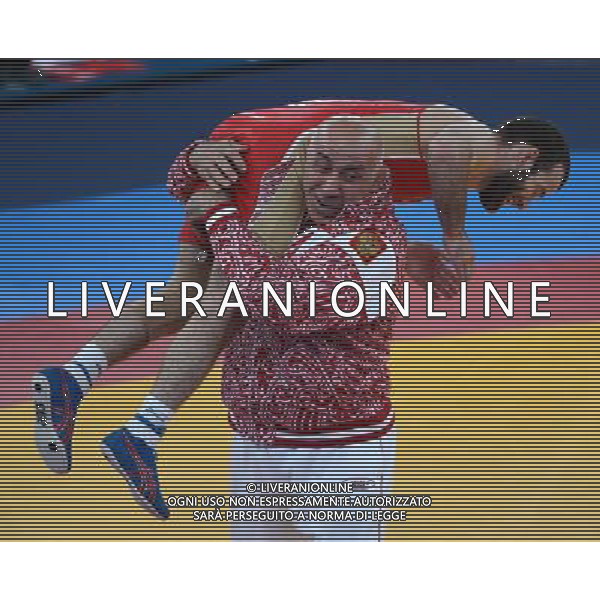 (120810) -- LONDON, Aug. 10, 2012 () -- Dzhamal Otarsultanov of Russia celebrates with his coach after defeating Vladimer Khinchegashvili of Georgia in men\'s wrestling freestyle 55kg gold medal contest, at London 2012 Olympic Games in London, Britain, on August 10, 2012. Dzhamal Otarsultanov of Russia won gold medal. (/Guo Yong) (nxl) ©photoshot/Agenzia Aldo Liverani Sas - ITALY ONLY - GIOCHI OLIMPICI, OLIMPIADI LONDRA 2012
