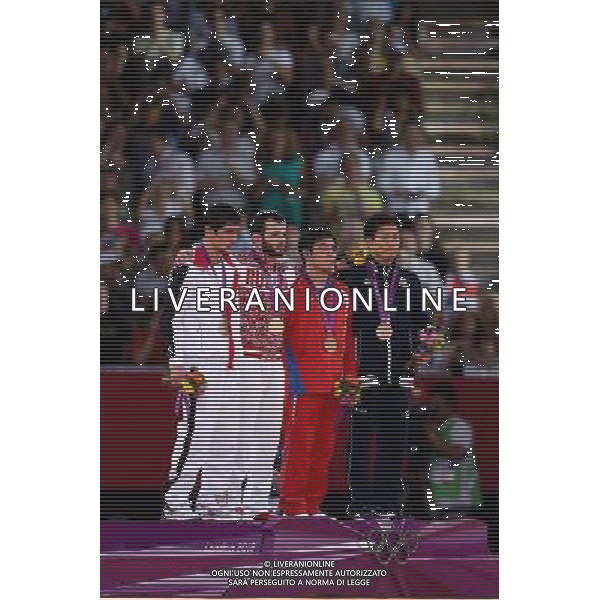 (120810) -- LONDON, Aug. 10, 2012 () -- Gold medalist Dzhamal Otarsultanov of Russia (2nd L), silver medalist Vladimer Khinchegashvili of Georgia (1st L) and bronze medalists Yang Kyong Il of DPRK (2nd R) and Shinichi Yumoto of Japan attend victory ceremony of men\'s wrestling freestyle 55kg contest, at London 2012 Olympic Games in London, Britain, on August 10, 2012. (/Jin Liwang) (nxl) ©photoshot/Agenzia Aldo Liverani Sas - ITALY ONLY - GIOCHI OLIMPICI, OLIMPIADI LONDRA 2012