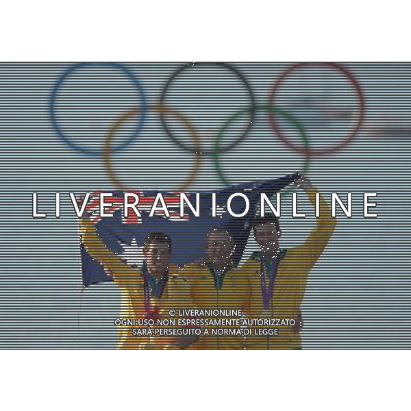 (120810) -- WEYMOUTH, Aug. 10, 2012 () -- Gold medalists Mathew Belcher/Malcolm Page of Australia and their coach Victor Kovalenko pose at awarding ceremony of 470 men competition of sailing event, at London 2012 Olympic Games in Weymouth and Portland, Britain, August 10, 2012.(/Zeng Yi) (zgp) ©photoshot/Agenzia Aldo Liverani Sas - ITALY ONLY - GIOCHI OLIMPICI, OLIMPIADI LONDRA 2012