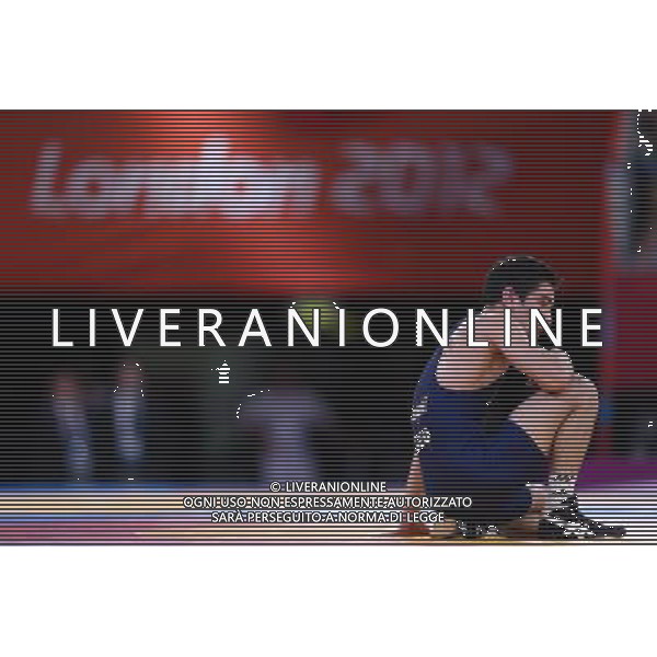 (120810) -- LONDON, Aug. 10, 2012 () -- Vladimer Khinchegashvili of Georgia is pictured after losing to Dzhamal Otarsultanov of Russia in men\'s wrestling freestyle 55kg gold medal contest, at London 2012 Olympic Games in London, Britain, on August 10, 2012. Dzhamal Otarsultanov of Russia won gold medal. (/Jin Liwang) (nxl) ©photoshot/Agenzia Aldo Liverani Sas - ITALY ONLY - GIOCHI OLIMPICI, OLIMPIADI LONDRA 2012