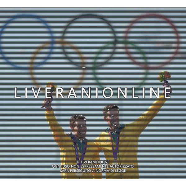 (120810) -- WEYMOUTH, Aug. 10, 2012 () -- Mathew Belcher/Malcolm Page (R) of Australia pose at awarding ceremony of 470 men competition of sailing event, at London 2012 Olympic Games in Weymouth and Portland, Britain, August 10, 2012. Mathew Belcher/Malcolm Page of Australia won gold medal. Luke Patience/Stuart Bithell of Britain won silver medal. (/Zeng Yi) (zgp) ©photoshot/Agenzia Aldo Liverani Sas - ITALY ONLY - GIOCHI OLIMPICI, OLIMPIADI LONDRA 2012