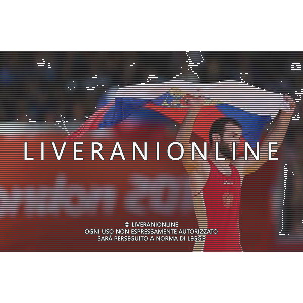 (120810) -- LONDON, Aug. 10, 2012 () -- Dzhamal Otarsultanov of Russia celebrates after defeating Vladimer Khinchegashvili of Georgia in men\'s wrestling freestyle 55kg gold medal contest, at London 2012 Olympic Games in London, Britain, on August 10, 2012. Dzhamal Otarsultanov of Russia won gold medal. (/Jin Liwang) (nxl) ©photoshot/Agenzia Aldo Liverani Sas - ITALY ONLY - GIOCHI OLIMPICI, OLIMPIADI LONDRA 2012