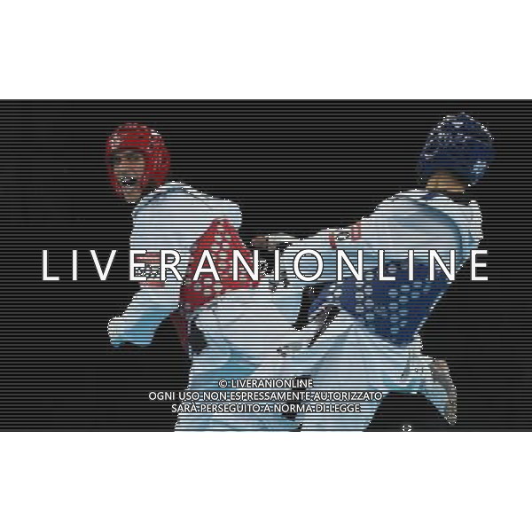 (120810) -- LONDON, Aug. 10, 2012 () -- Sebastian Eduardo Crismanich (red) of Argentina competes with Arman Yeremyan of Armenia during men\'s -80 kg taekwondo semifinal at London 2012 Olympic Games, London, Britain, Aug. 10, 2012. Sebastian Eduardo Crismanich won the match 2-1 and advanced to final. (/Liu Dawei)(zgp) ©photoshot/Agenzia Aldo Liverani Sas - ITALY ONLY - GIOCHI OLIMPICI, OLIMPIADI LONDRA 2012