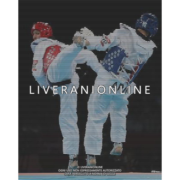 (120810) -- LONDON, Aug. 10, 2012 () -- Sebastian Eduardo Crismanich (red) of Argentina competes with Arman Yeremyan of Armenia during men\'s -80 kg taekwondo semifinal at London 2012 Olympic Games, London, Britain, Aug. 10, 2012. Sebastian Eduardo Crismanich won the match 2-1 and advanced to final. (/Liu Dawei)(zgp) ©photoshot/Agenzia Aldo Liverani Sas - ITALY ONLY - GIOCHI OLIMPICI, OLIMPIADI LONDRA 2012