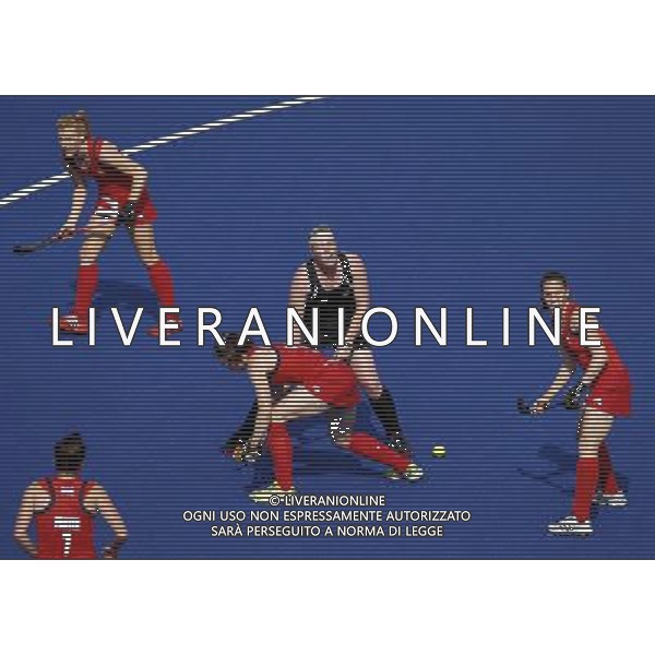 (120810) -- LONDON, Aug. 10, 2012 () -- Katie Glynn (2nd R) of New Zealand vies for the ball with British players during the women\'s hockey bronze medal match at London 2012 Olympic Games, London, Britain, Aug. 10, 2012. Britain won the match 3-1 and claimed the bronze medal of the event. (/Shen Bohan) ©photoshot/Agenzia Aldo Liverani Sas - ITALY ONLY - GIOCHI OLIMPICI, OLIMPIADI LONDRA 2012