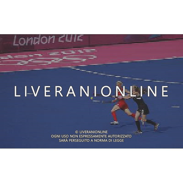 (120810) -- LONDON, Aug. 10, 2012 () -- Alex Danson of Britain (L) competes with Samantha Charlton of New Zealand during the women\'s hockey bronze medal match at London 2012 Olympic Games, London, Britain, Aug. 10, 2012. Britain won the match 3-1 and claimed the bronze medal of the event. (/Shen Bohan) ©photoshot/Agenzia Aldo Liverani Sas - ITALY ONLY - GIOCHI OLIMPICI, OLIMPIADI LONDRA 2012