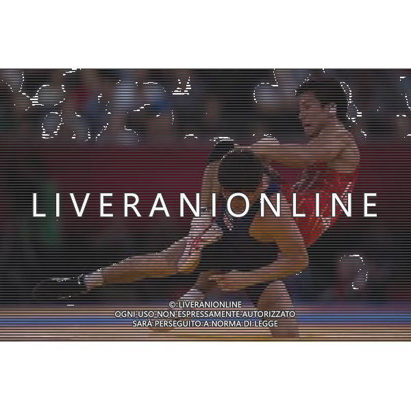 (120810) -- LONDON, Aug. 10, 2012 () -- Vladimer Khinchegashvili of Georgia (in blue) competes with Shinichi Yumoto of Japan during men\'s wrestling freestyle 55kg contest, at London 2012 Olympic Games in London, Britain, on August 10, 2012. Vladimer Khinchegashvili of Georgia won. (/Jin Liwang) (nxl) ©photoshot/Agenzia Aldo Liverani Sas - ITALY ONLY - GIOCHI OLIMPICI, OLIMPIADI LONDRA 2012