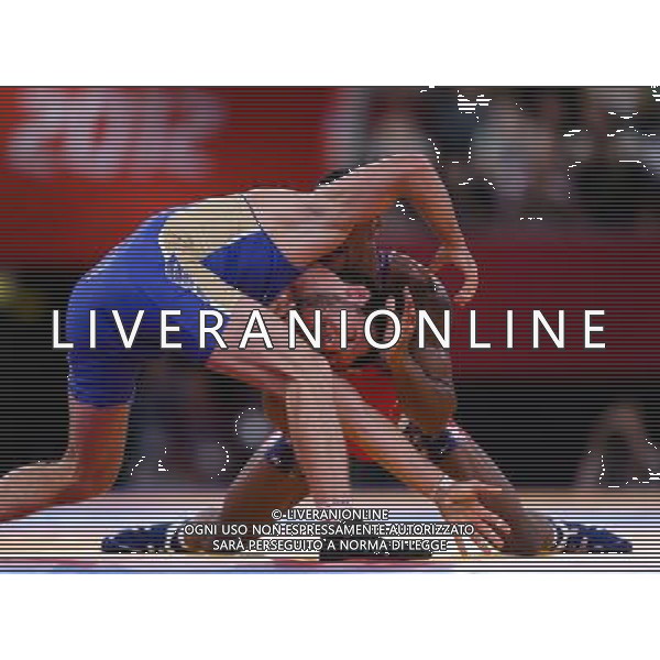 (120810) -- LONDON, Aug. 10, 2012 () -- Jordan Ernest Burroughs of USA (in red) competes with Denis Tsargush of Russia during men\'s wrestling freestyle 74kg semifinals competition, at London 2012 Olympic Games in London, Britain, on August 10, 2012. Jordan Ernest Burroughs of USA won. (/Jin Liwang) (nxl) ©photoshot/Agenzia Aldo Liverani Sas - ITALY ONLY - GIOCHI OLIMPICI, OLIMPIADI LONDRA 2012