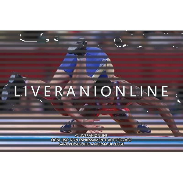 (120810) -- LONDON, Aug. 10, 2012 () -- Jordan Ernest Burroughs of USA (in red) competes with Denis Tsargush of Russia during men\'s wrestling freestyle 74kg semifinals competition, at London 2012 Olympic Games in London, Britain, on August 10, 2012. Jordan Ernest Burroughs of USA won. (/Jin Liwang) (nxl) ©photoshot/Agenzia Aldo Liverani Sas - ITALY ONLY - GIOCHI OLIMPICI, OLIMPIADI LONDRA 2012