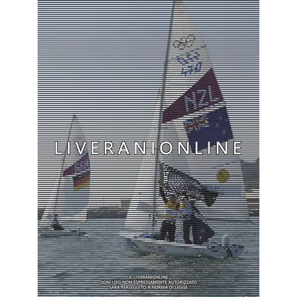 (120810) -- WEYMOUTH, Aug. 10, 2012 () -- Jo Aleh (R)/Olivia Powrie of New Zealand celebrate after 470 women competition of sailing event, at London 2012 Olympic Games in Weymouth and Portland, Britain, August 10, 2012. Jo Aleh/Olivia Powrie of New Zealand won gold medal. (/Zeng Yi) (zgp) ©photoshot/Agenzia Aldo Liverani Sas - ITALY ONLY - GIOCHI OLIMPICI, OLIMPIADI LONDRA 2012