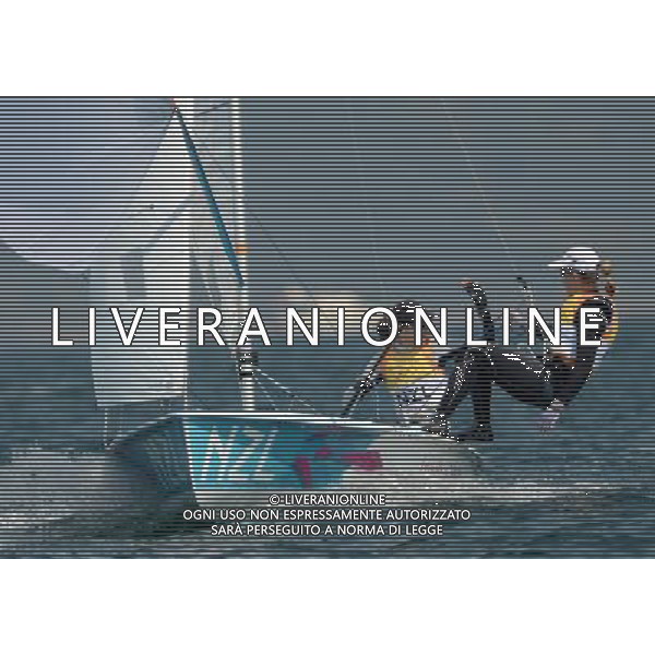 (120810) -- WEYMOUTH, Aug. 10, 2012 () -- Jo Aleh (L)/Olivia Powrie of New Zealand celebrate after 470 women competition of sailing event, at London 2012 Olympic Games in Weymouth and Portland, Britain, August 10, 2012. Jo Aleh/Olivia Powrie of New Zealand won gold medal. (/Zeng Yi) (zgp) ITALY ONLY - GIOCHI OLIMPICI, OLIMPIADI LONDRA 2012