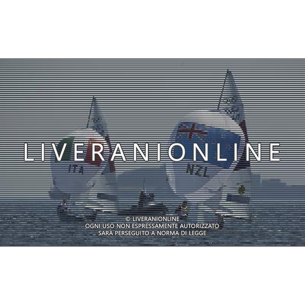 (120810) -- WEYMOUTH, Aug. 10, 2012 () -- Jo Aleh/Olivia Powrie of New Zealand (R) compete in 470 women competition of sailing event, at London 2012 Olympic Games in Weymouth and Portland, Britain, August 10, 2012. Jo Aleh/Olivia Powrie of New Zealand won gold medal. (/Fei Maohua) (zgp) ITALY ONLY - GIOCHI OLIMPICI, OLIMPIADI LONDRA 2012